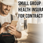 A smiling contractor shops for small group health insurance on his cell phone