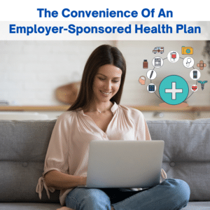 A business woman smiles while looking at her laptop. Above, "The Convenience of An Employer-Sponsored Health Plan" is written