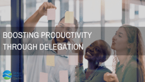 Boosting Productivity Through Delegation text overlaying image of employees